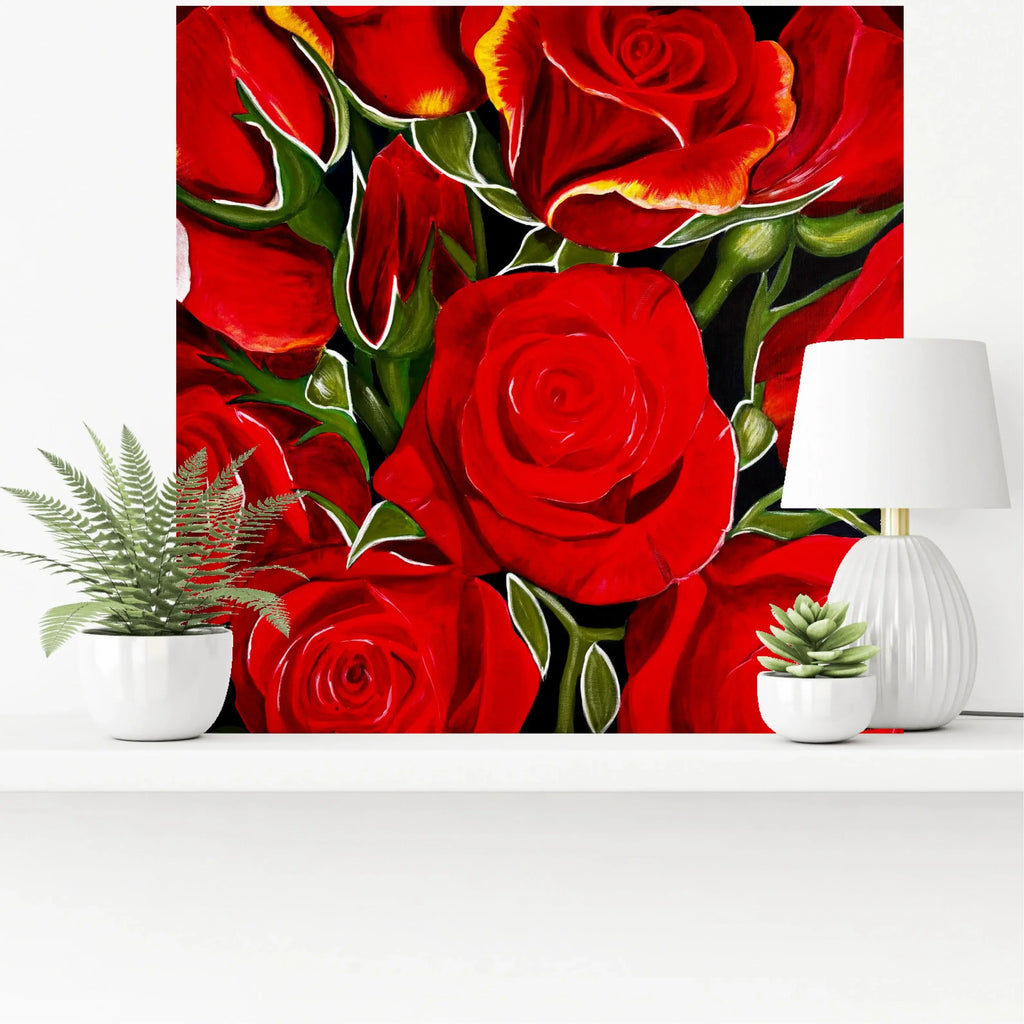mysilence art acrylic art piece with vibrant red roses, displayed above white shelf with plants and lamp