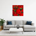 mysilence art acrylic art piece featuring vibrant red roses displayed above a modern grey sofa