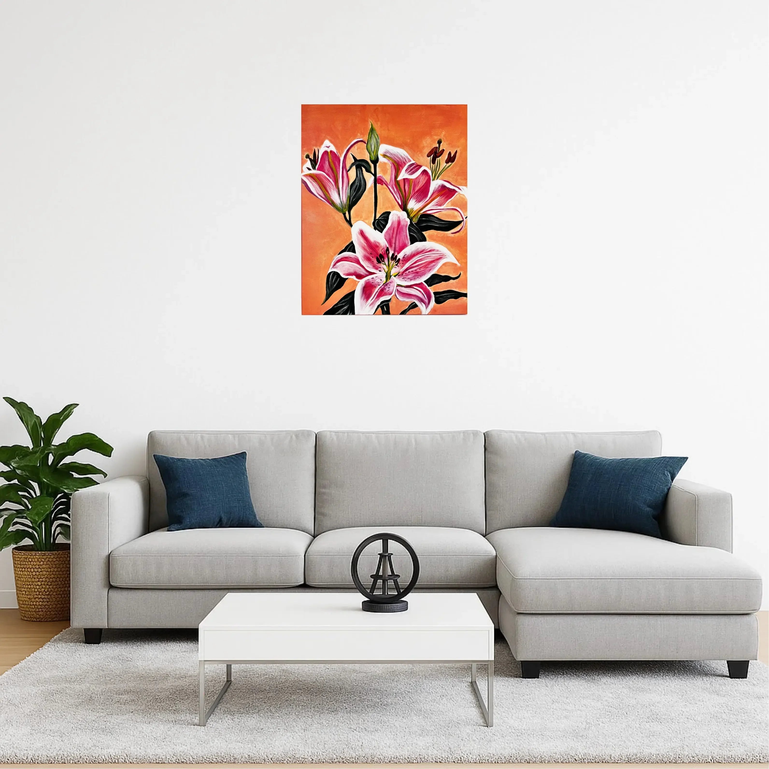 mysilence art acrylic art piece of pink lilies on orange background above modern gray sofa